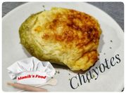 Una foto de gratinado de chayote
