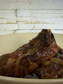 Una foto de Costillas de cerdo al vino tinto