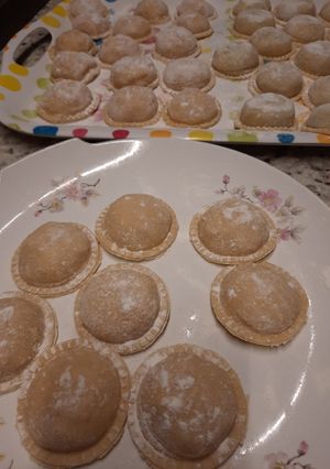Una foto de Sorrentinos de champiñones y panceta