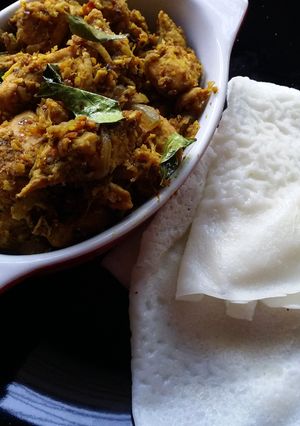 A picture of Neer dosa and Sukka chicken.