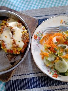 Una foto de Zapallitos rellenos con quinoa y choclo