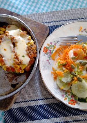 Una foto de Zapallitos rellenos con quinoa y choclo