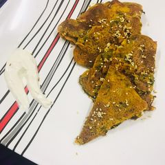 A picture of Mint & sesame breakfast pizza.