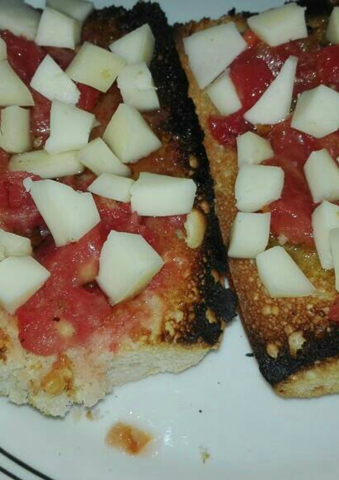 Una foto de Tostada de queso y tomate