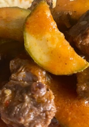 A picture of Pork Ribs in Red Sauce with Chile de Árbol.