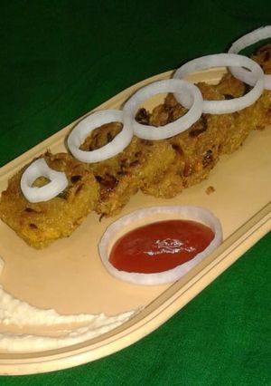 A picture of Poha and oats tikki with hummus.
