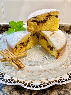 Una foto de Bizcocho de naranja relleno de chocolate fondant