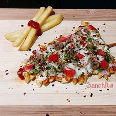 A picture of Potato French Fries Pizza.