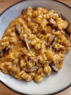 Una foto de Mac&cheese trufa y setas