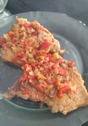 Una foto de Costeletas de cerdo en disco de arado