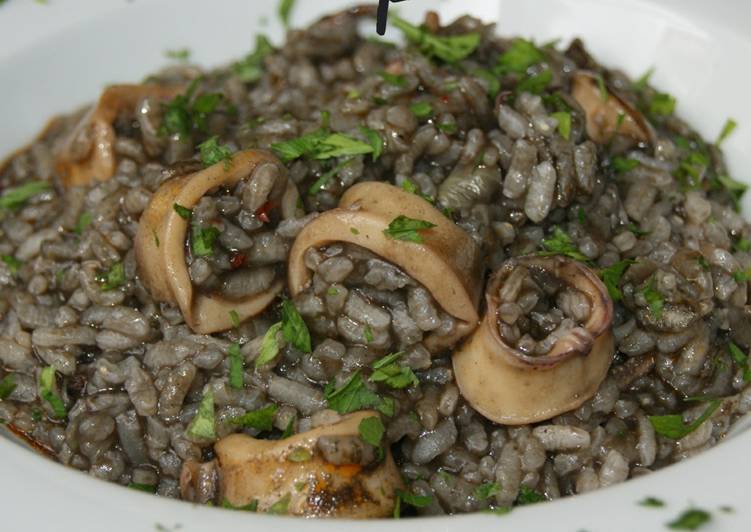 Arroz meloso con calamares picantes