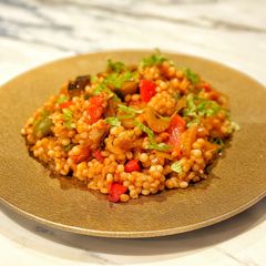 A picture of Caponata with pearl couscous.