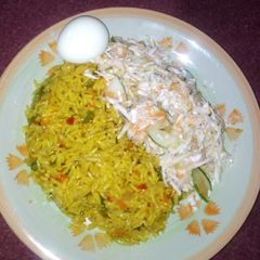 A picture of Fried rice wit coleslow.