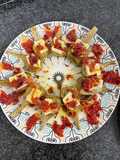 Alcachofas confitadas con brie y crujiente de jamón ibérico
