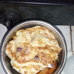A picture of IrishPatoto chips, plantain and fried egg.