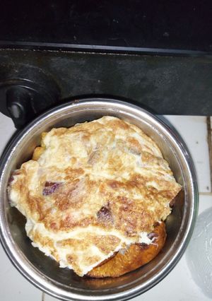 A picture of IrishPatoto chips, plantain and fried egg.