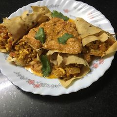 A picture of Shahi papad roll curry.