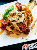 Tagliatelle with Cherry Tomato Pesto, Burrata, and Pistachios