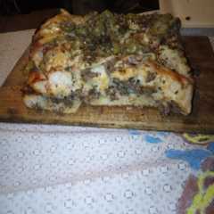 Una foto de Pizza rellena de carne picada 🍕