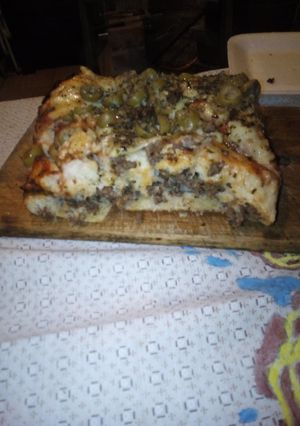 Una foto de Pizza rellena de carne picada 🍕