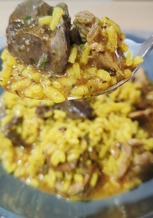 Una foto de Arroz meloso trufado con hígados y mollejas de pollo