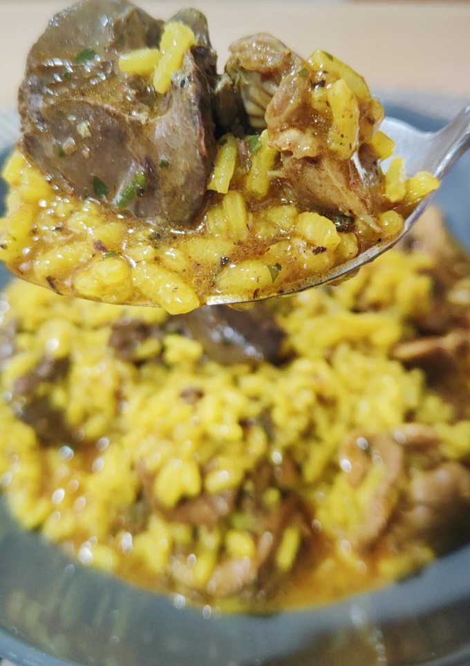 Una foto de Arroz meloso trufado con hígados y mollejas de pollo