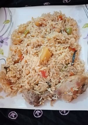 A picture of Chana aloo chicken pulao.