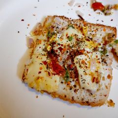 A picture of Bread egg cheese grill slices.