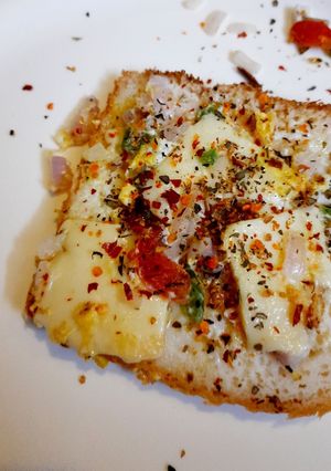 A picture of Bread egg cheese grill slices.