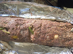 Una foto de Rollo de carne molida relleno de vegetales