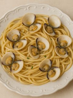 Una foto de Spaghettis con almejas
