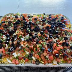 A picture of 7-Layer dip casserole.