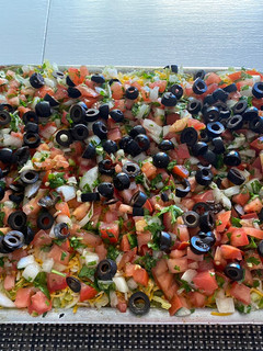 A picture of 7-Layer dip casserole.