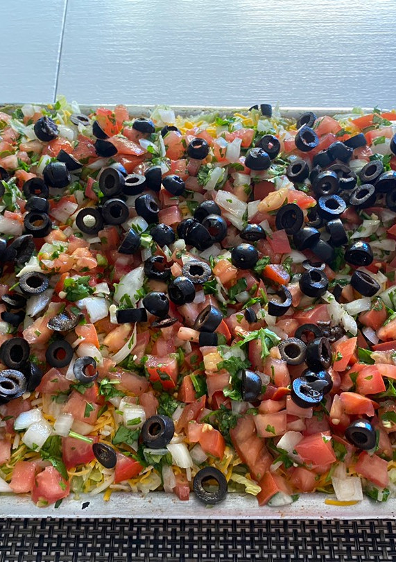 A picture of 7-Layer dip casserole.