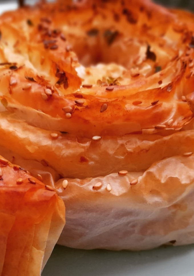 Una foto de Mhancha de jamón y queso