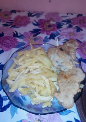 Una foto de Papas fritas con forrado
