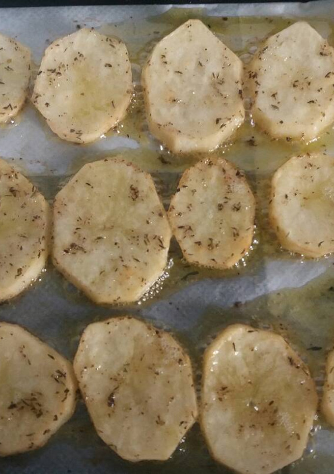 Una foto de Patatas al horno con especias.🍟
