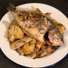 A picture of Roasted sea bream. Spiced cauliflower, apple, fennel & hazelnut.