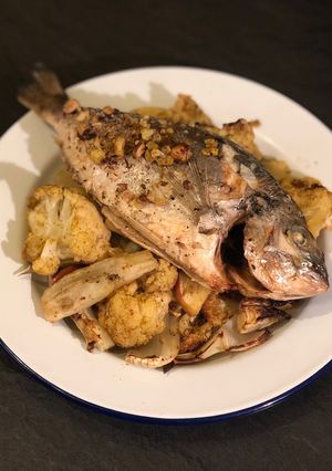 A picture of Roasted sea bream. Spiced cauliflower, apple, fennel & hazelnut.