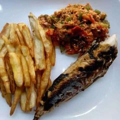 Potato chips,grilled fish and egg sauce A picture of Potato chips,grilled fish and egg sauce.