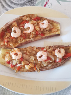 Una foto de Berenjenas rellenas de gambas