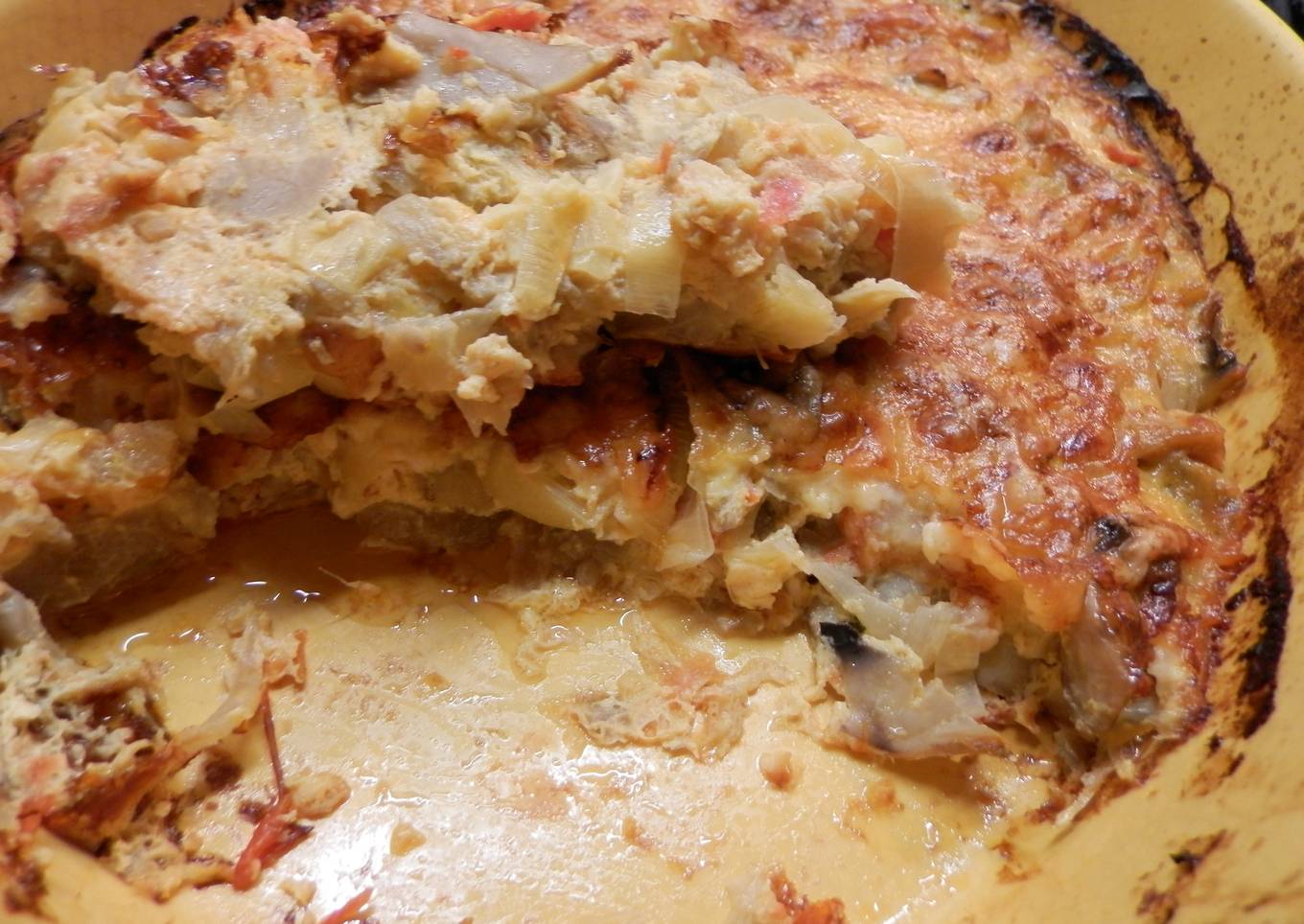 Gratinado de setas, berenjenas, puerros y tomates
