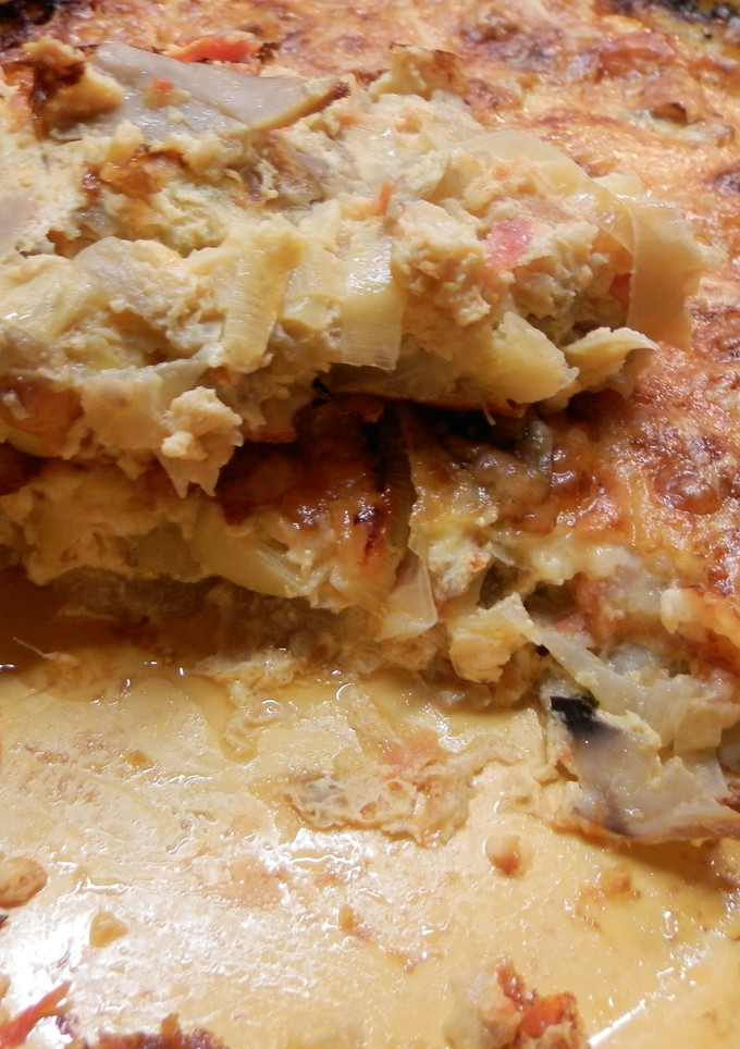 Una foto de Gratinado de setas, berenjenas, puerros y tomates