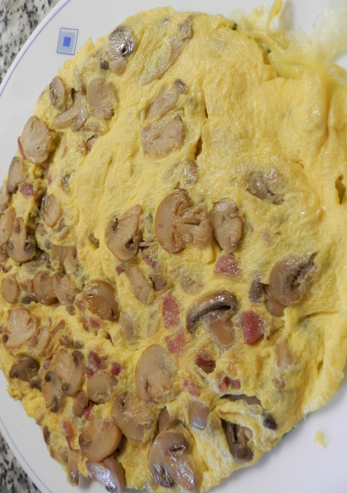 Una foto de Tortilla de champiñones
