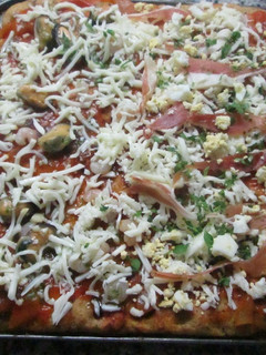 Una foto de Pizza mixta integral