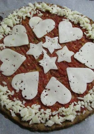 Una foto de Pizza margarita dietética con base de atún