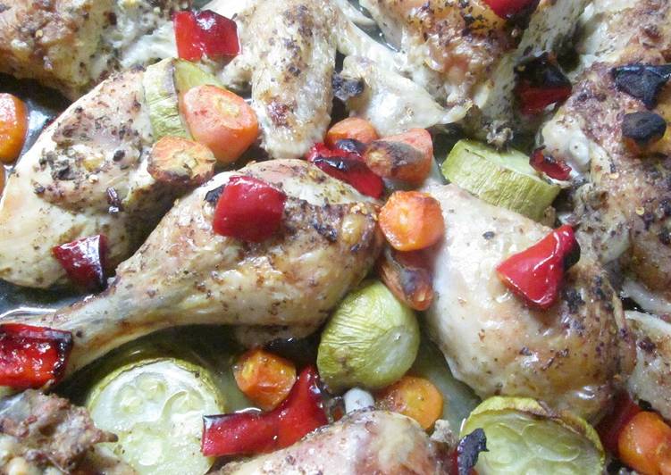 Presas de pollo picantes con calabacín y zanahoria al horno
