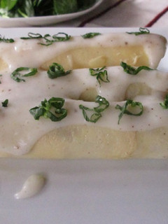 Una foto de Canelones de espinacas dietéticos