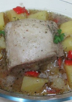 Una foto de Lomo de cerdo y patatas con cerveza