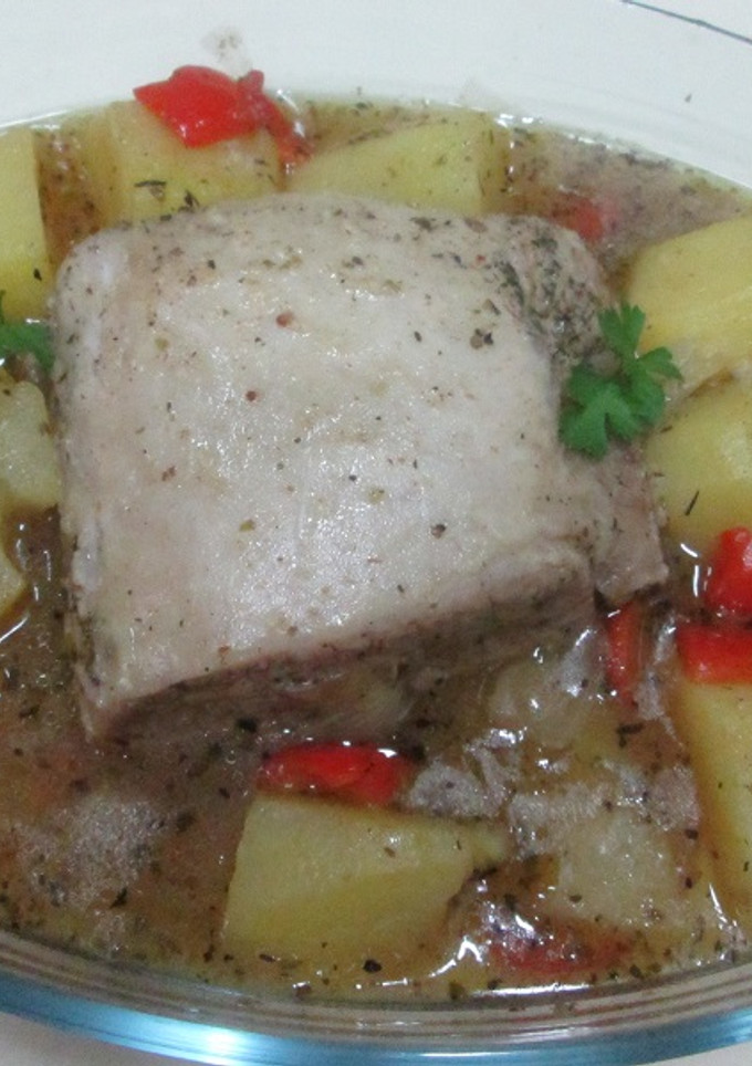 Una foto de Lomo de cerdo y patatas con cerveza